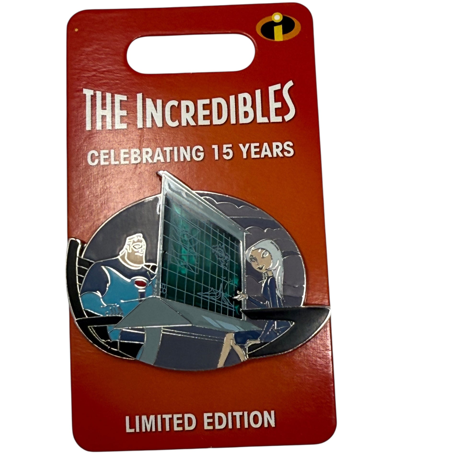 Pin with 'The Incredibles' design on a red card celebrating 15 years, limited edition.