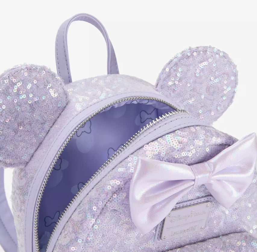 disney minnie mini backpacks Disney Minnie Mouse Sequined Loungefly Mini Backpack – Opalescent Purp – World of Treasures
