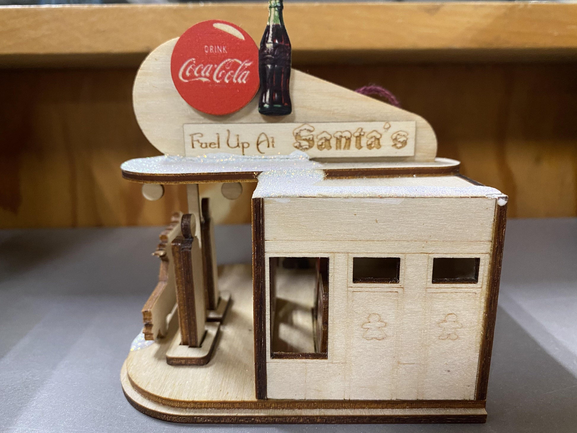 Ginger Cottage Coca Cola Filling Station Cottage Wooden Ornament - World of Treasures